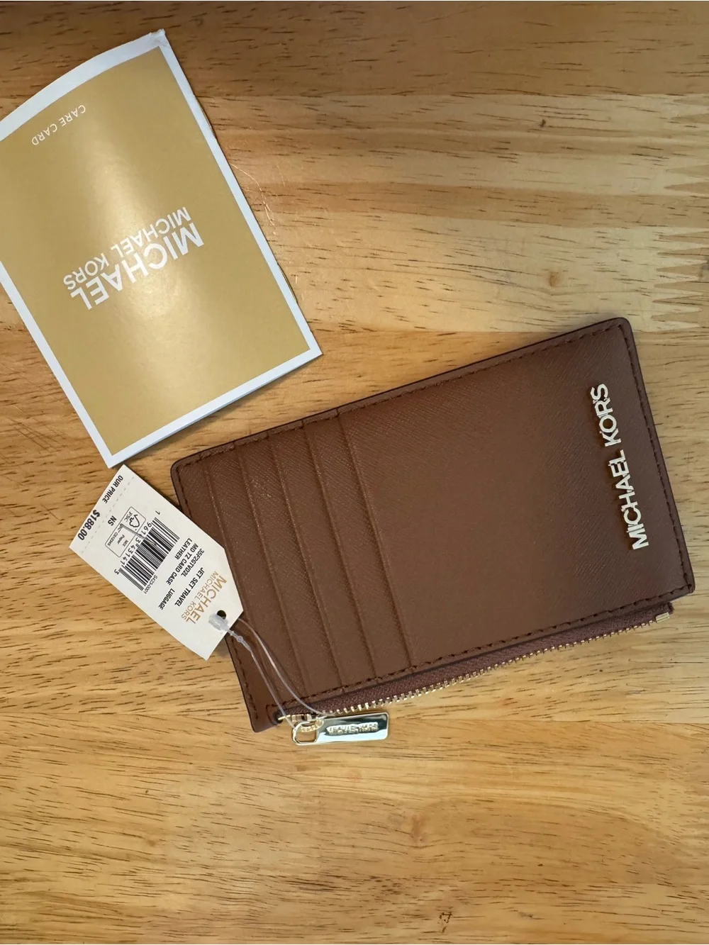 NWT defect Michael Kors Brown Leather Zip Card Case